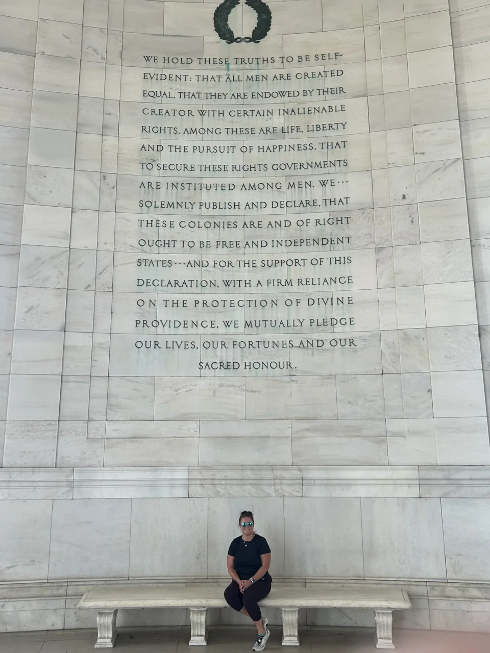 Kim Cunningham seated at the Jefferson Memorial